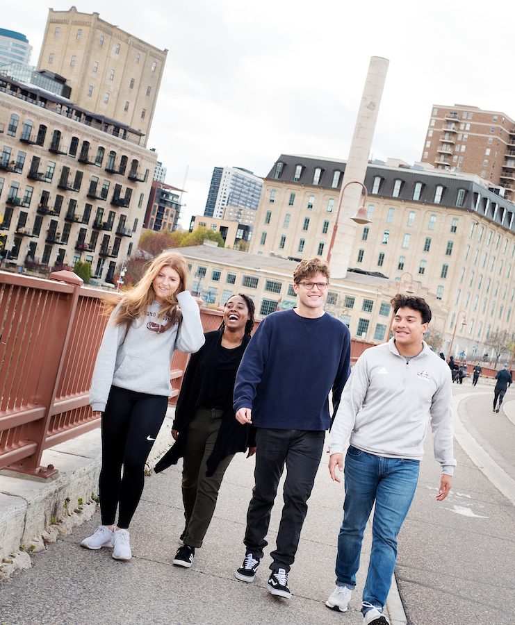 Augsburg Students on the Stone Arch Bridge